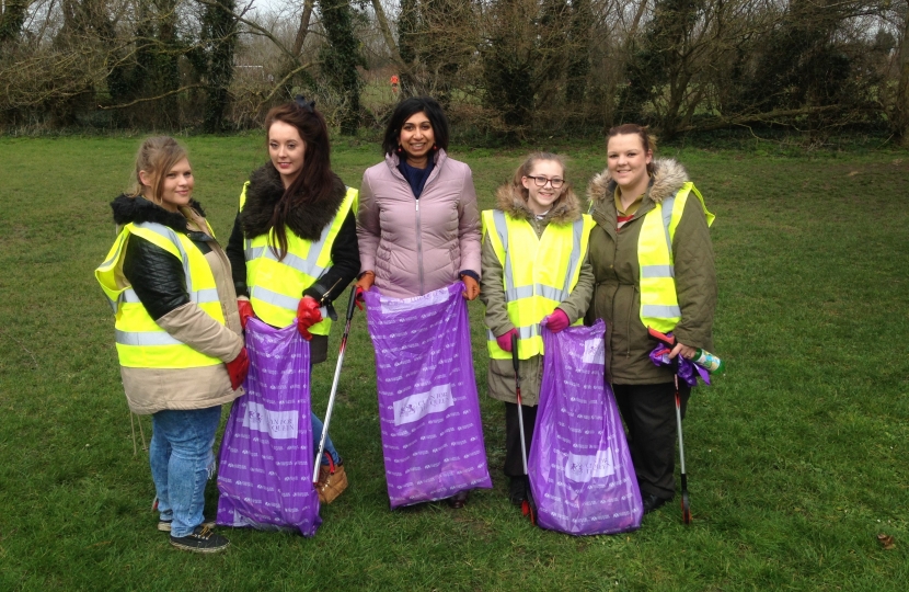 Suella with young people from Fareham litter picking as part of "Clean Up Day", at Wicor recreation park in Fareham