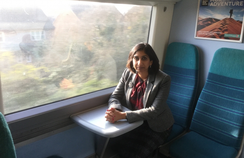 Suella on train 