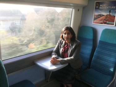 Suella on train 